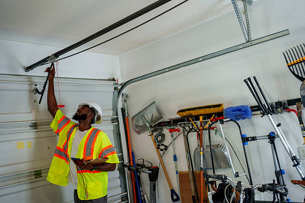 Professional Garage Door Panel Replacement technician working in Cherokee, NC